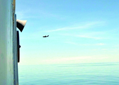 骚扰我国护渔编队的马来西亚军机。南都记者周皓 通讯员 周冬华 摄